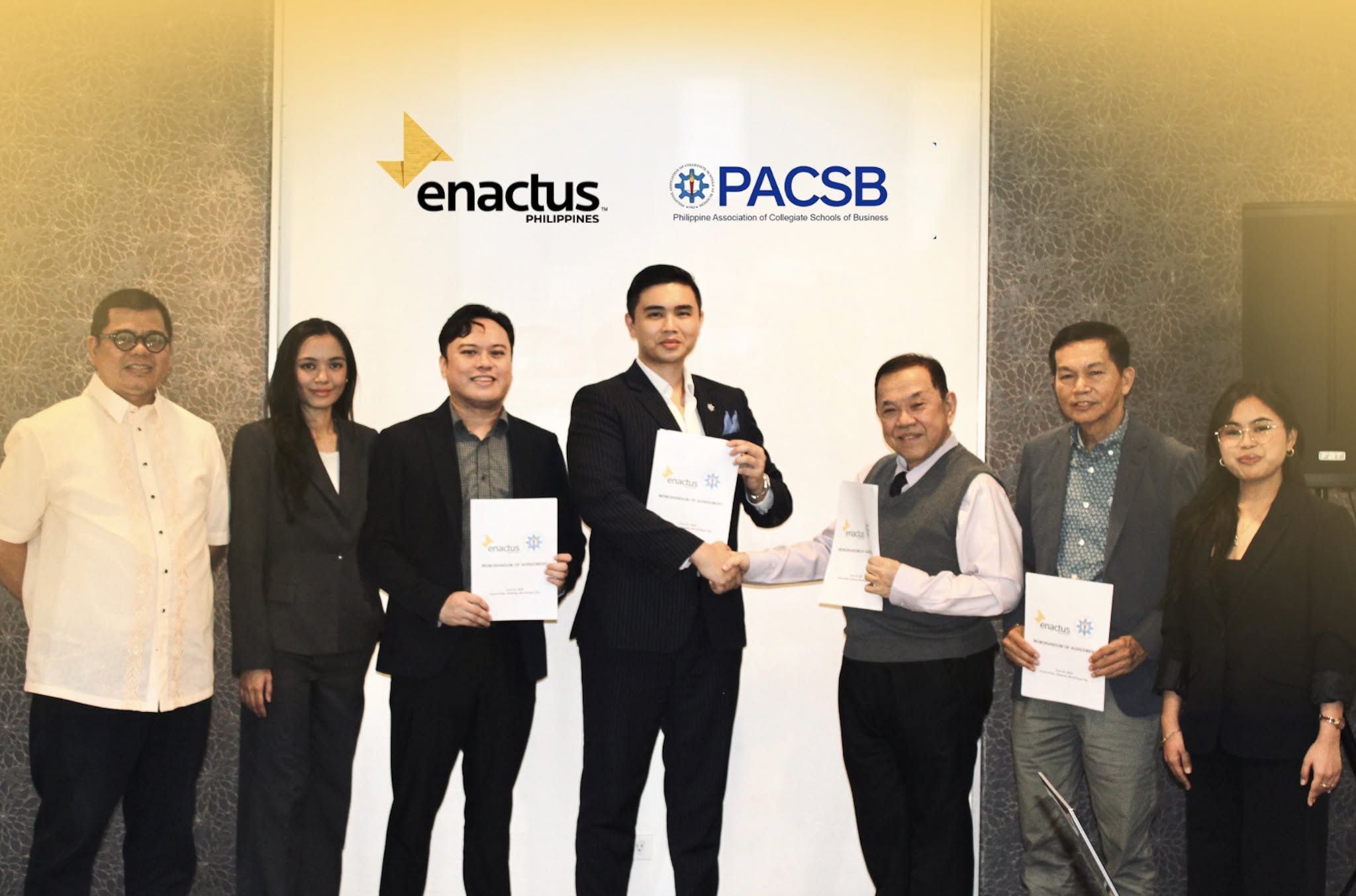 Filipino student entrepreneurs presenting their venture
